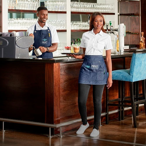 Indoor Cafe scene waitress and waiter looking outwards from a table counter