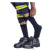 Person wearing black safety shoes, navy socks, and reflective safety pants on a white background