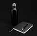 Giftset items showing a stainless steel bottle, a notebook and a ballpoint pen