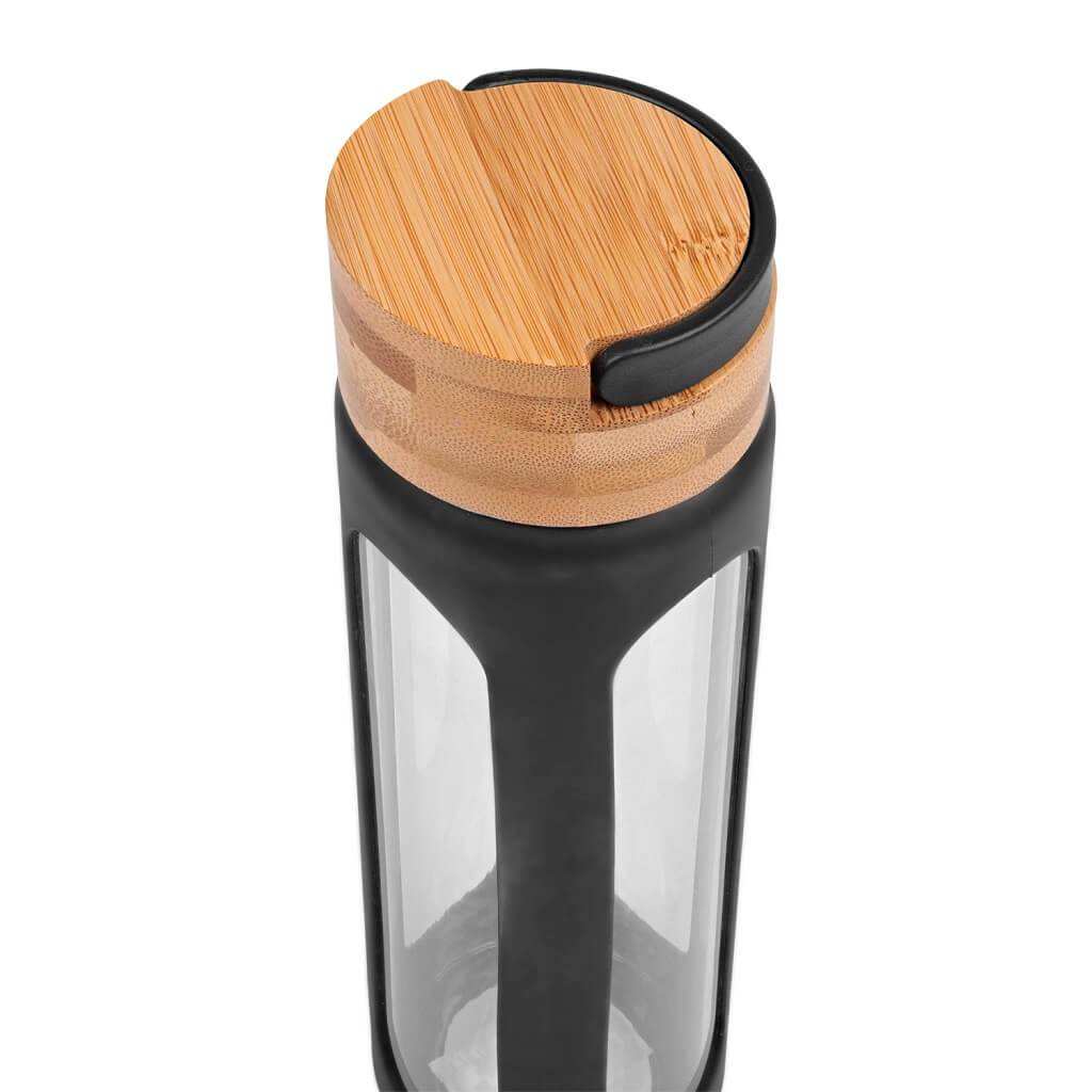 A glass bottle with a white background